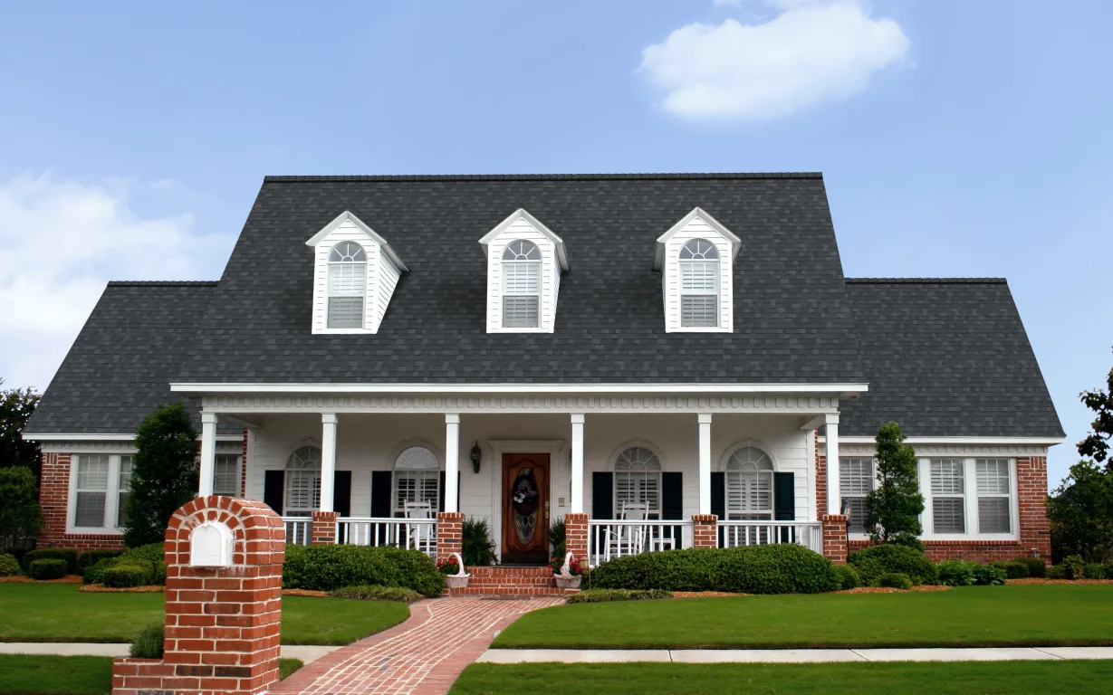 O_OnyxBlack_RGB_house_full_sky.webp